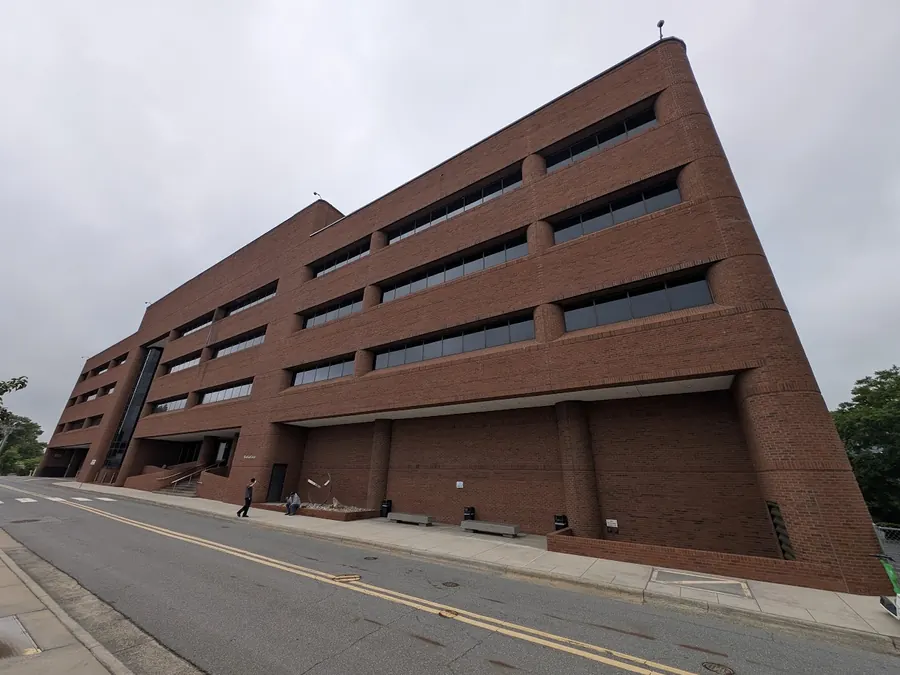 Brick exterior of the West End Center main building seen from street level