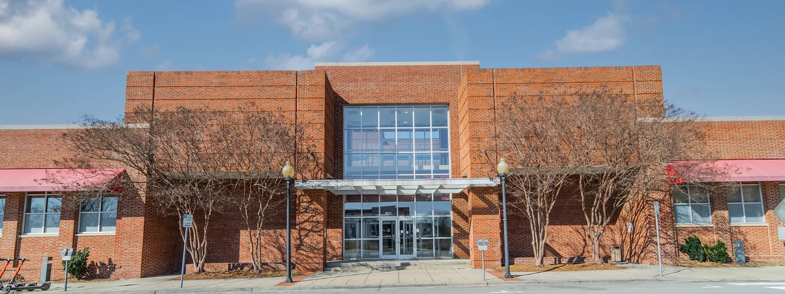 Street-level front elevation of the Annex, with its glazed central entrance bay on West 4th Street